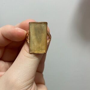 Elegant Gold-Toned Ring with Yellow Gemstone